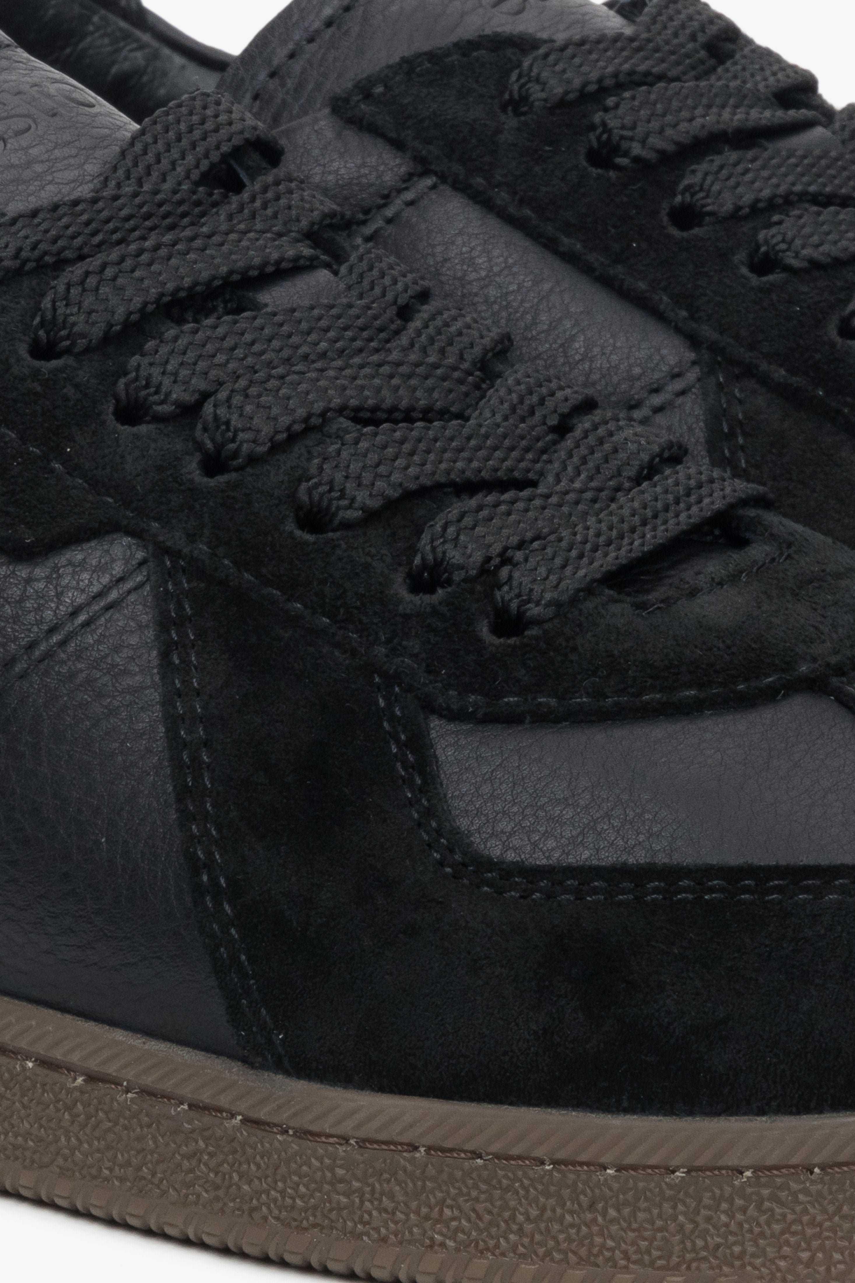 Luxury men’s sneakers crafted from a combination of high-quality Italian genuine leather and soft black velour.
