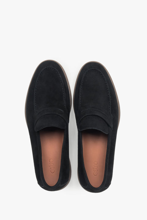 Black men’s moccasins made of natural velour on a soft sole.
