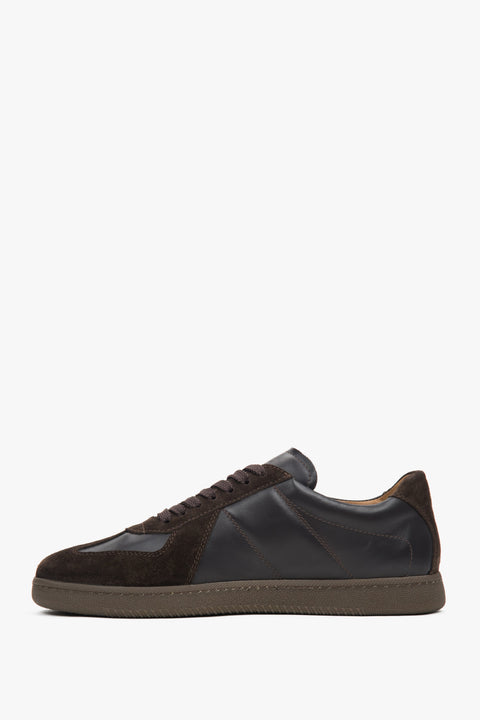 Stylish men’s urban sneakers combining sporty comfort with luxurious leather and velour detailing.