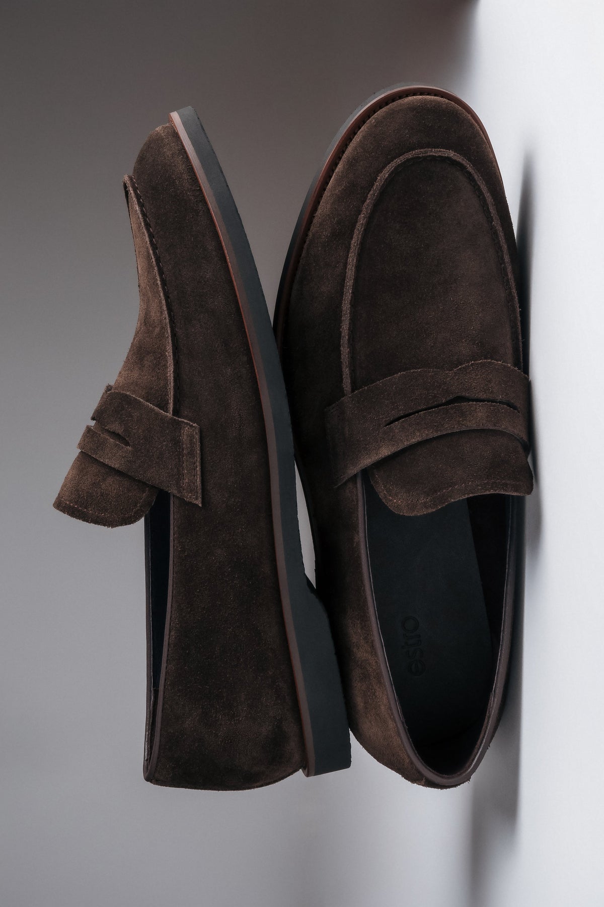 Stylish dark brown loafers with a flat rubber sole for spring and autumn.
