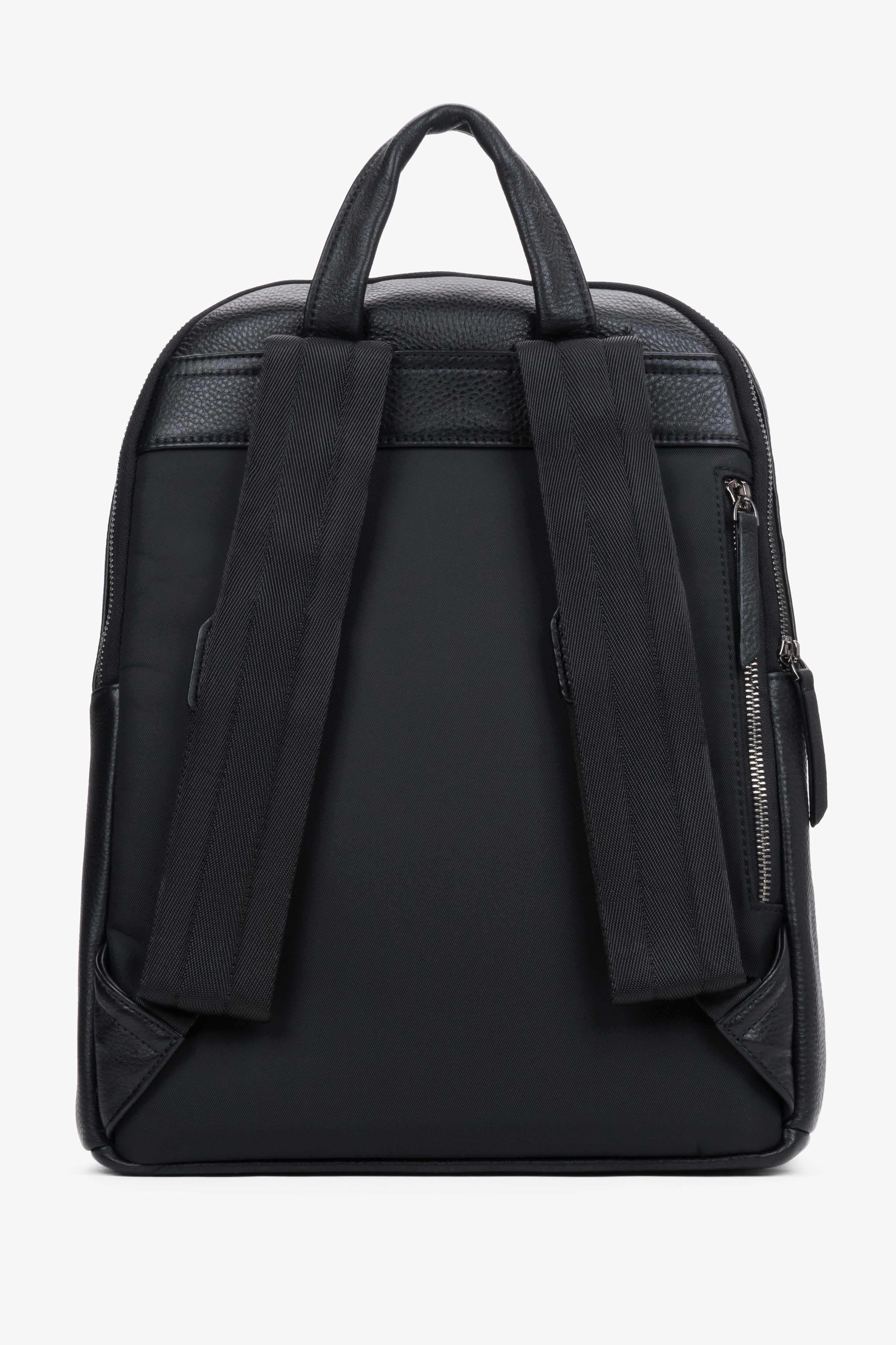 Classic men's backpack made of natural pebbled leather in an elegant style – detail close-up.
