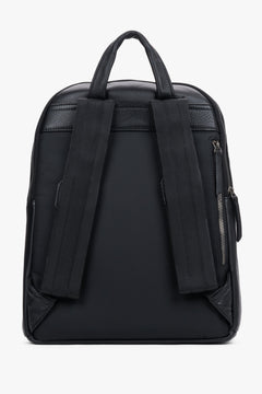 Classic men's backpack made of natural pebbled leather in an elegant style – detail close-up.