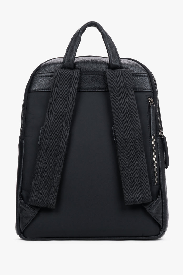 Classic men's backpack made of natural pebbled leather in an elegant style – detail close-up.