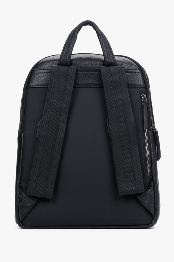 Classic men's backpack made of natural pebbled leather in an elegant style – detail close-up.