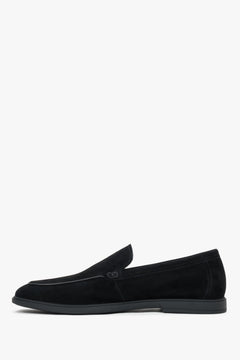 Sleek black velour slip-on shoes for men with decorative raised stitching.