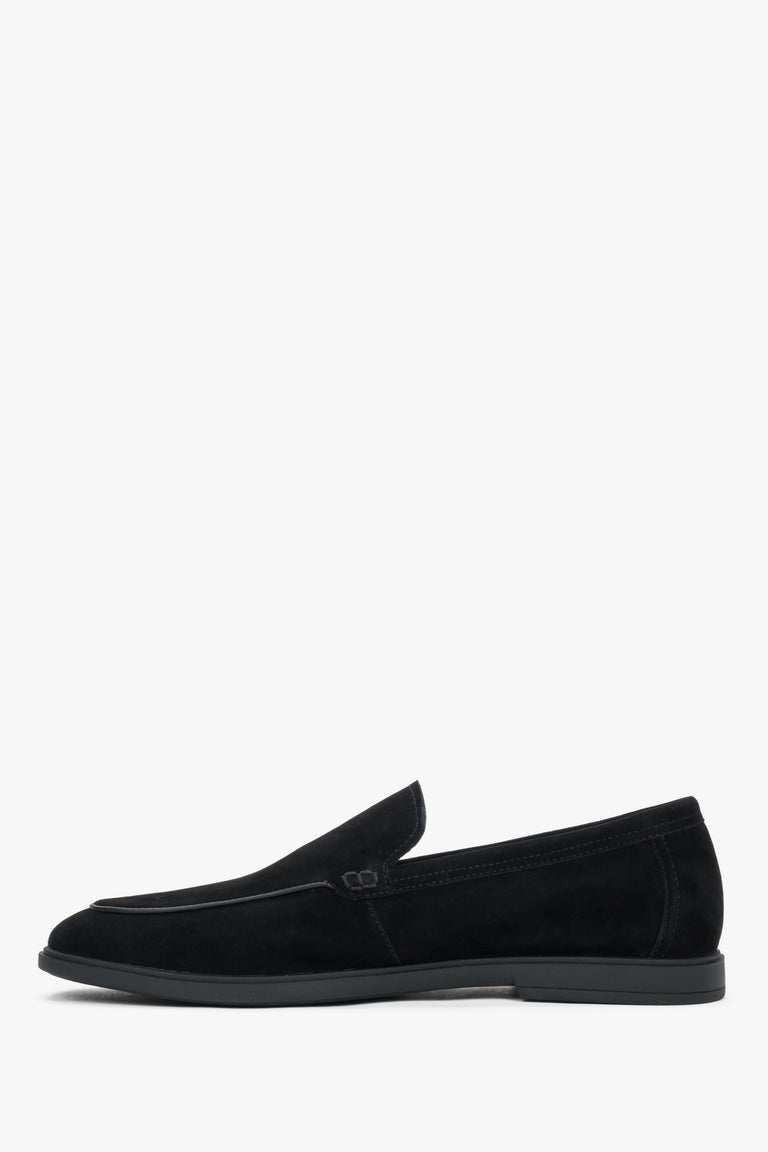 Sleek black velour slip-on shoes for men with decorative raised stitching.