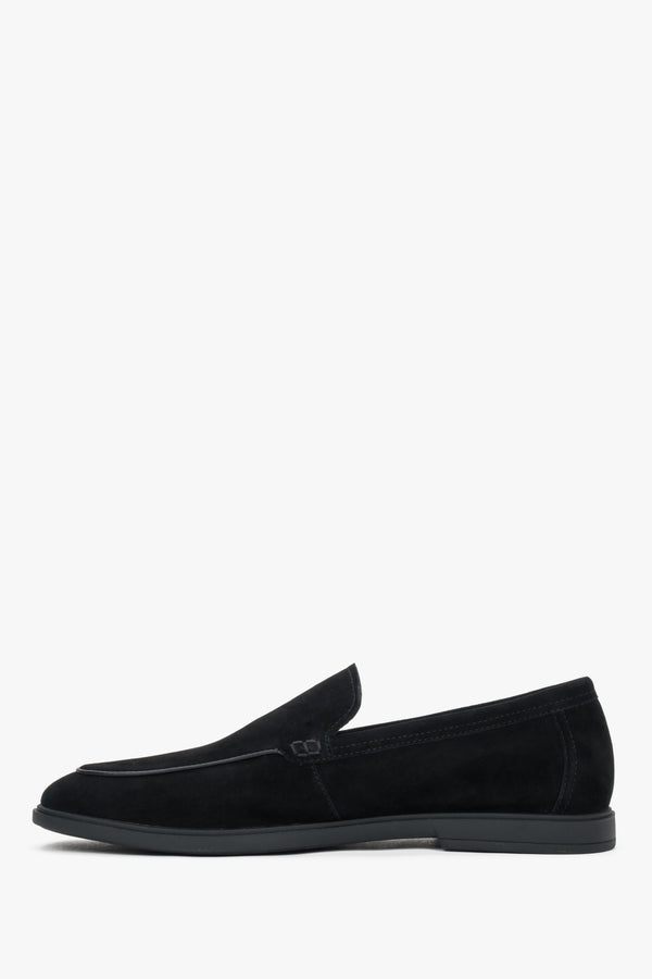 Sleek black velour slip-on shoes for men with decorative raised stitching.