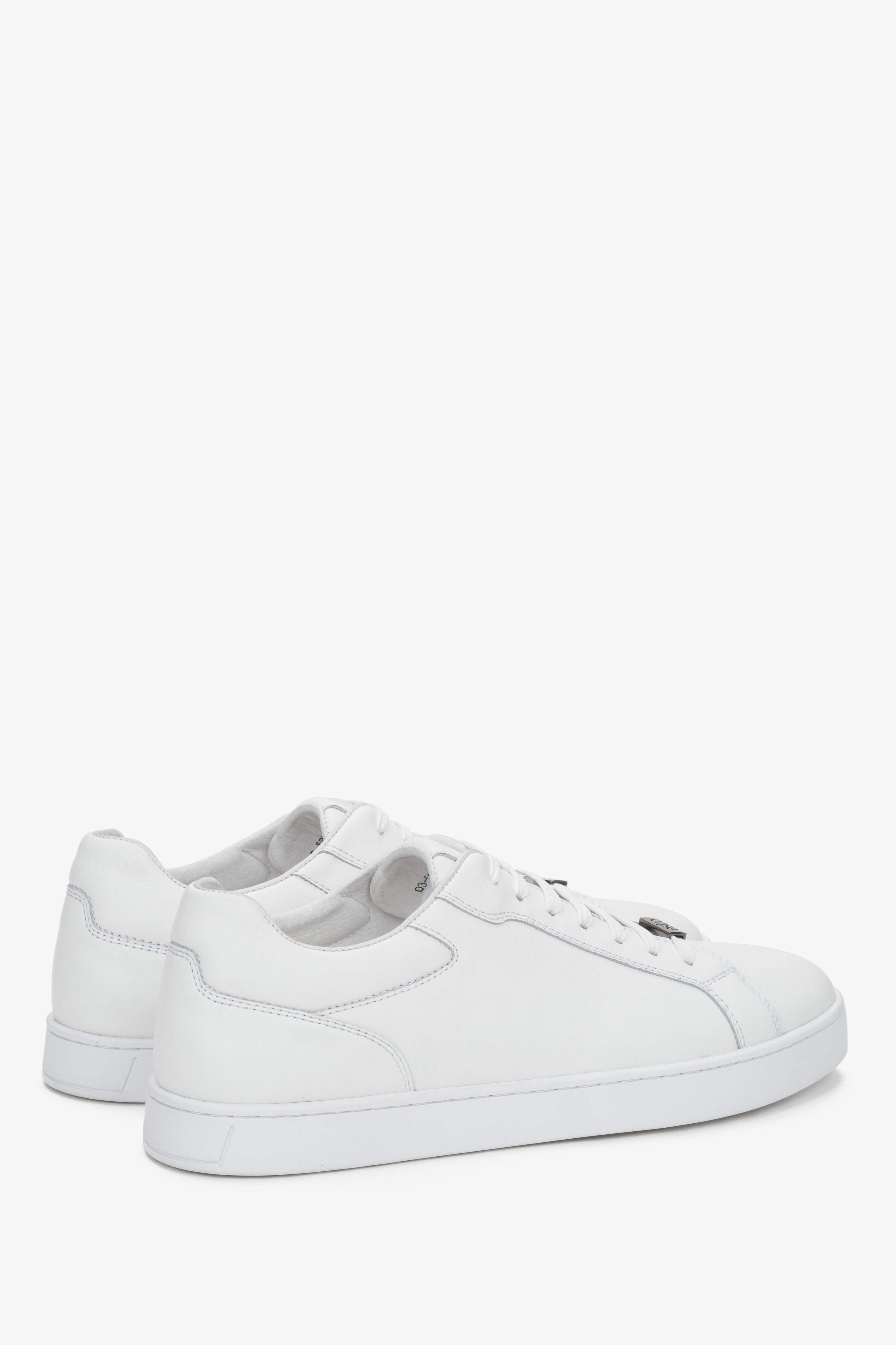 Side view showing the smooth leather upper and flat rubber sole.