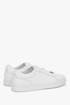 Side view showing the smooth leather upper and flat rubber sole.