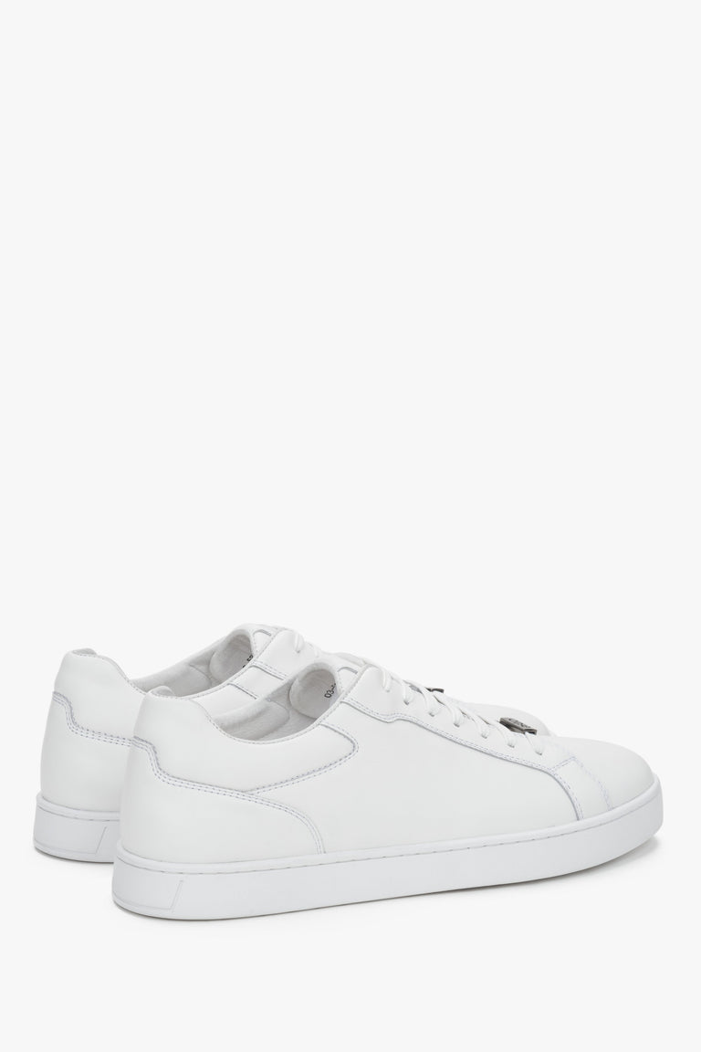 Side view showing the smooth leather upper and flat rubber sole.