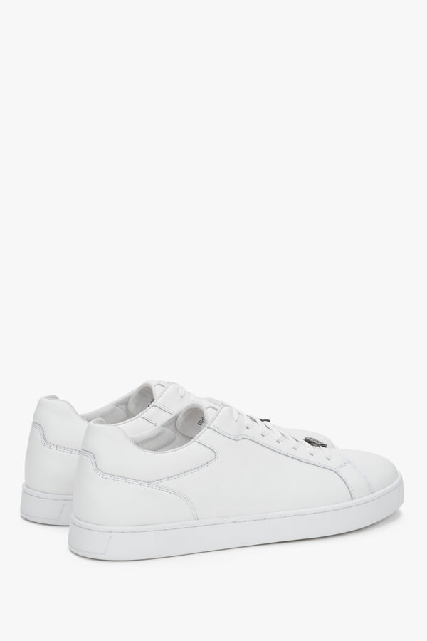 Side view showing the smooth leather upper and flat rubber sole.