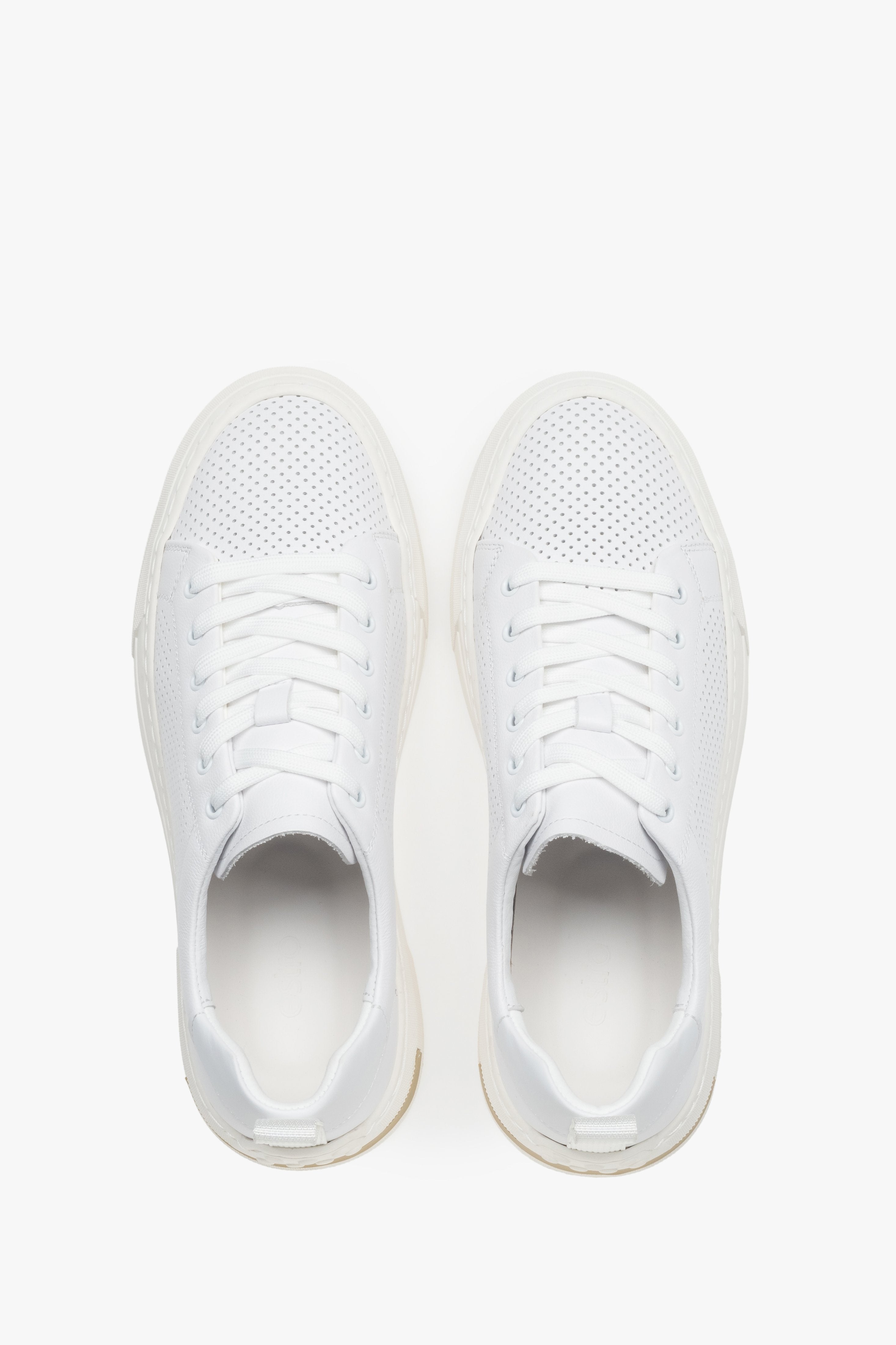 White leather lace-up sneakers with a contrasting sole insert.