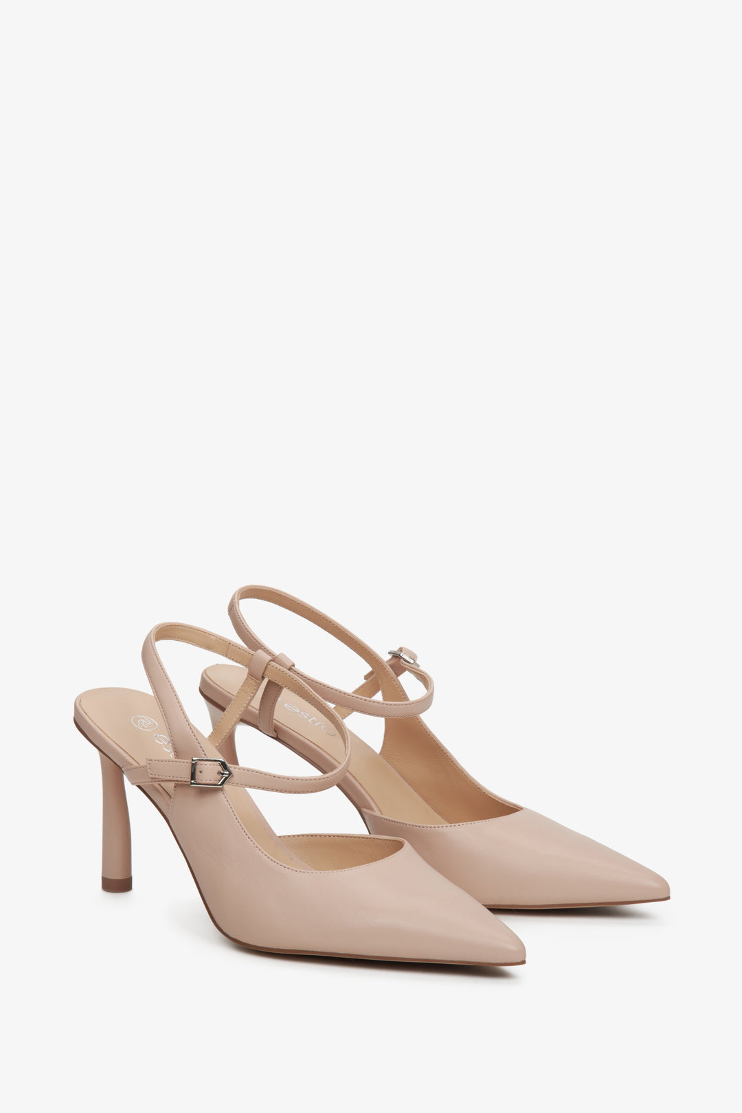 High heeled women's slingback shoes with a pointed toe in beige.