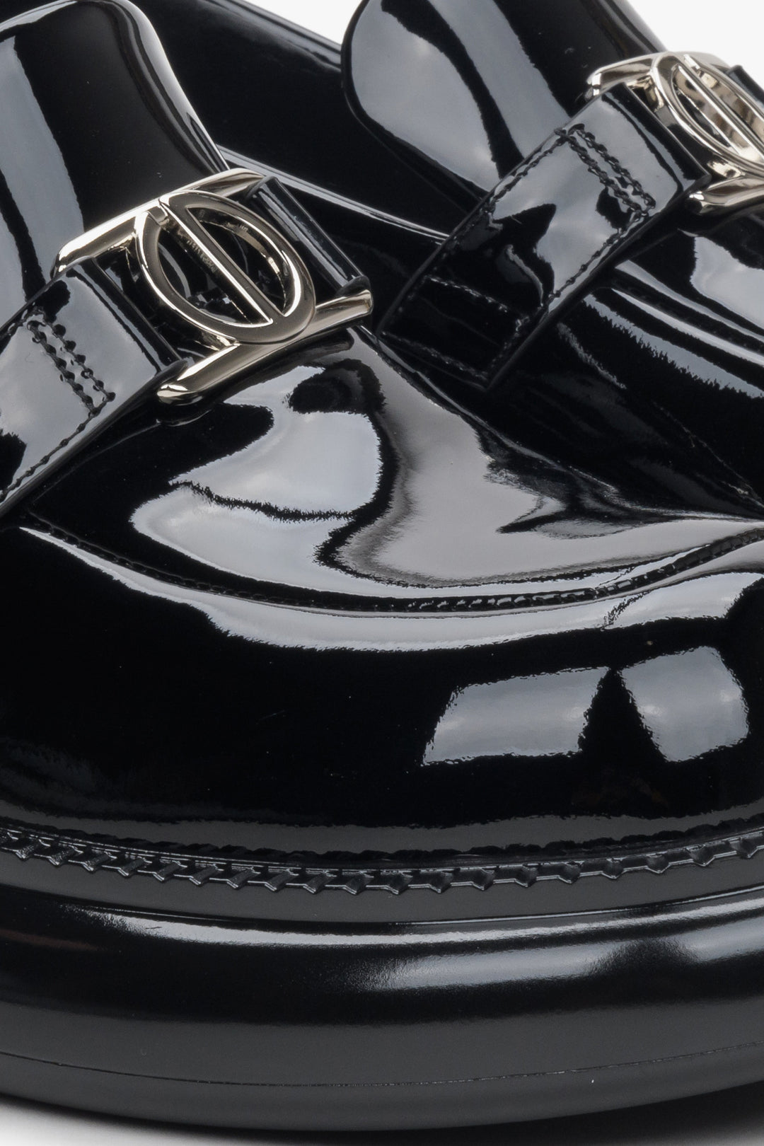 Patent leather black loafers - a close-up on details.