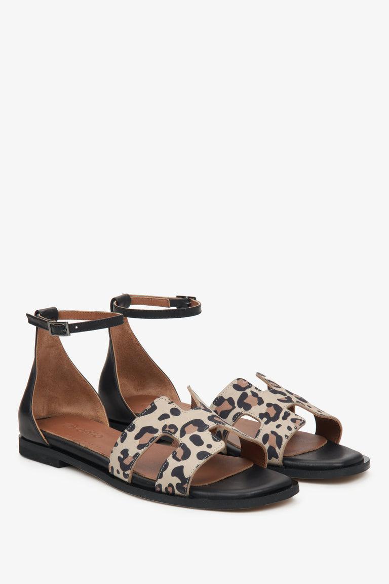 Estro women's brown sandals with an animal print insert.