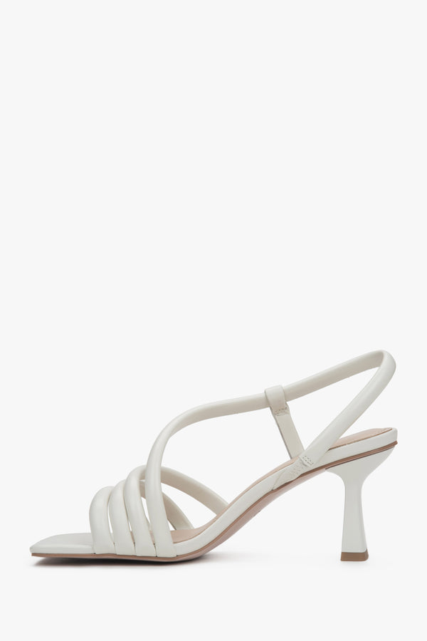 Women's milky white leather sandals Estro, showcasing the stable 7 cm block heel and elegantly tailored, smooth upper straps.