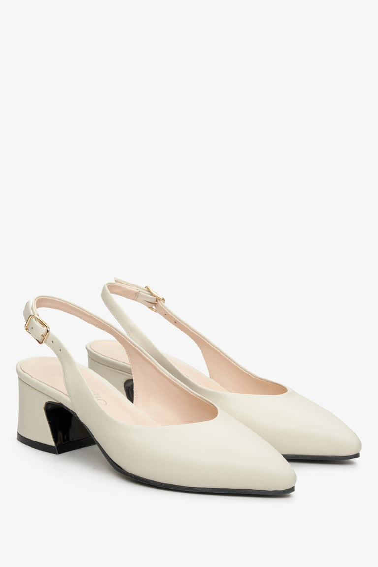 Women's light beige open-back pumps by Estro.