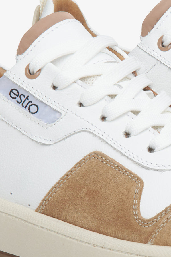 Men's leather-velour sneakers in white-brown color - close-up on details.