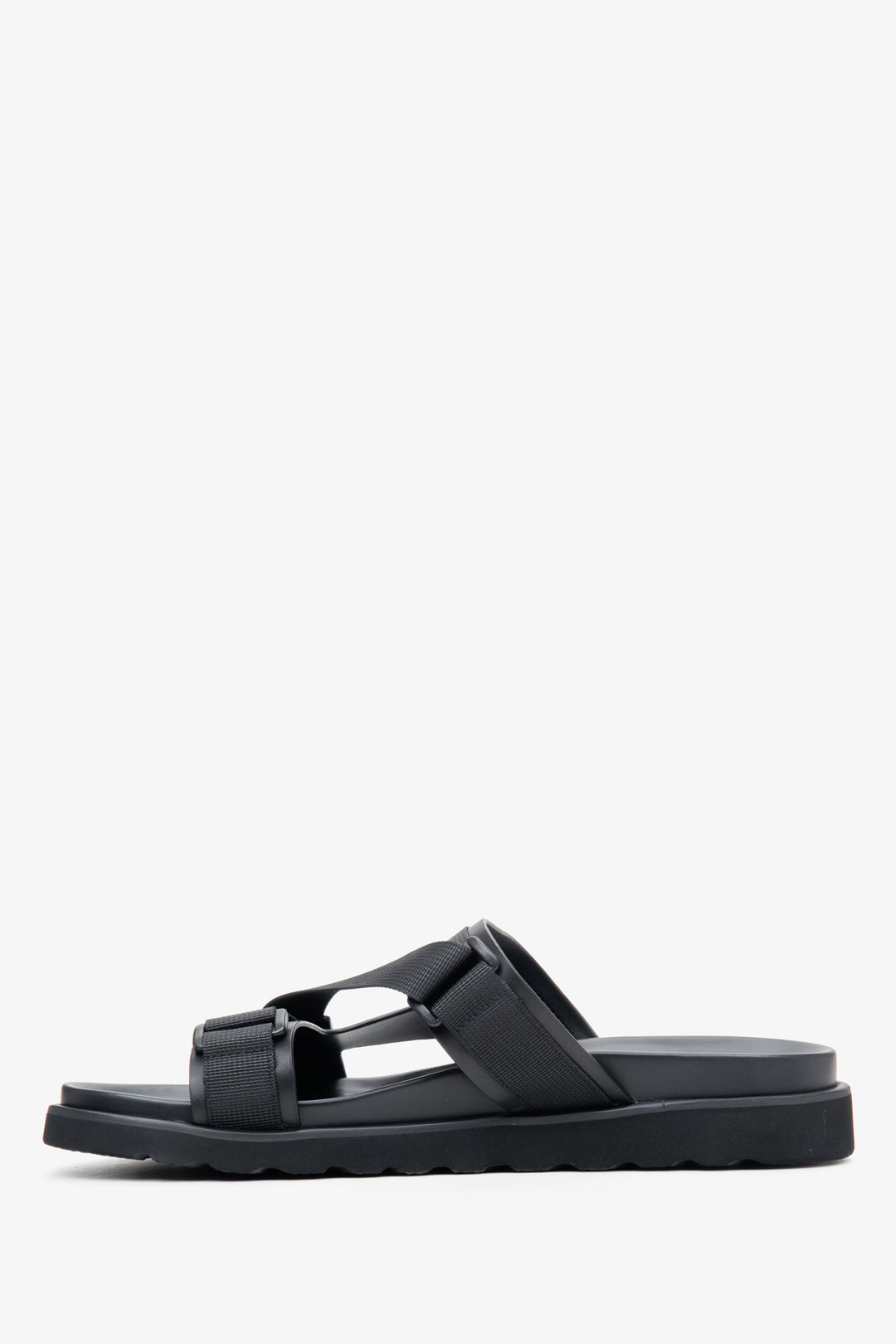 Men's black slides with flexible sole, made from genuine leather and textiles - shoe profile.
