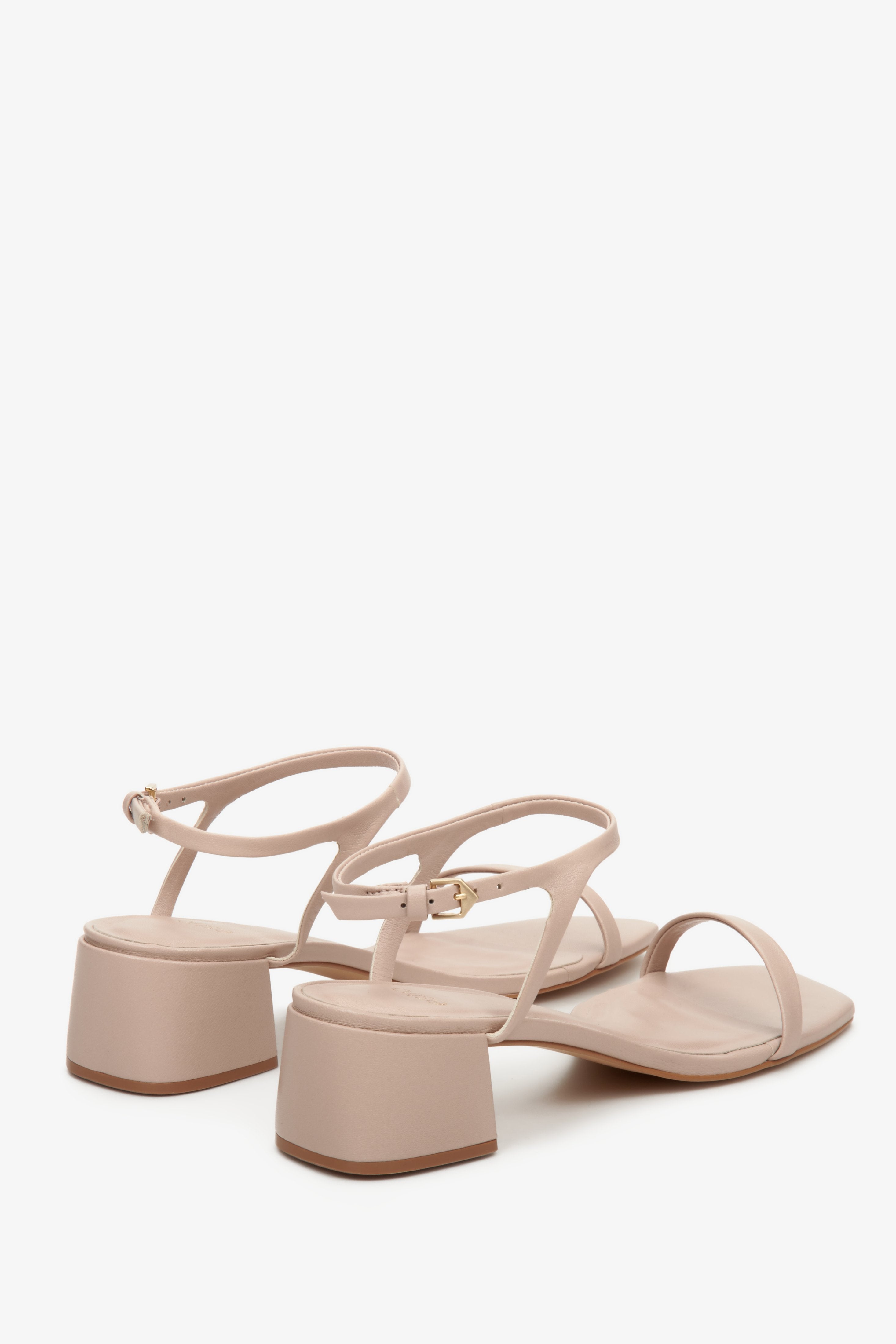 Comfortable women's beige sandals made of genuine leather by Estro - close-up on the heel.