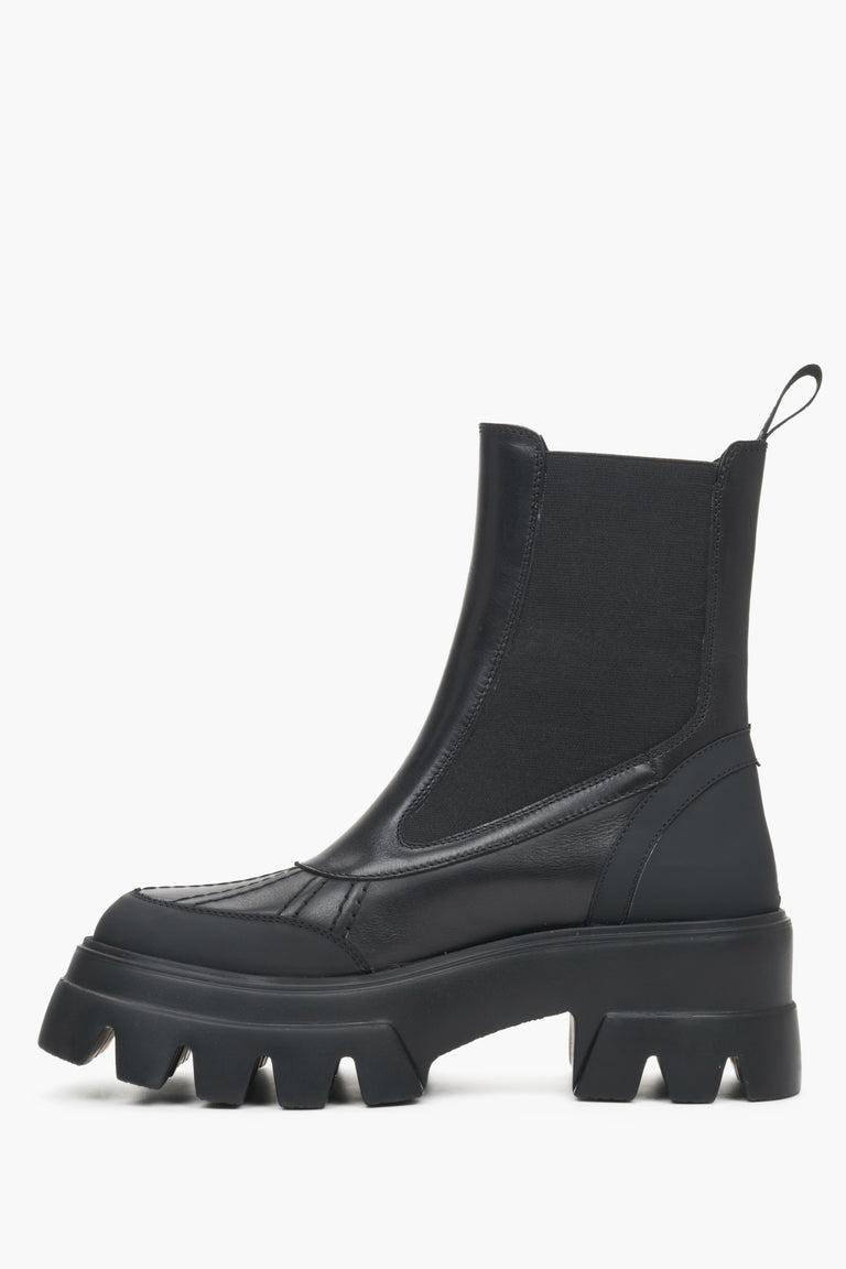 High women's black boots made of genuine leather with an elastic insert by Estro - profile view of the shoe.