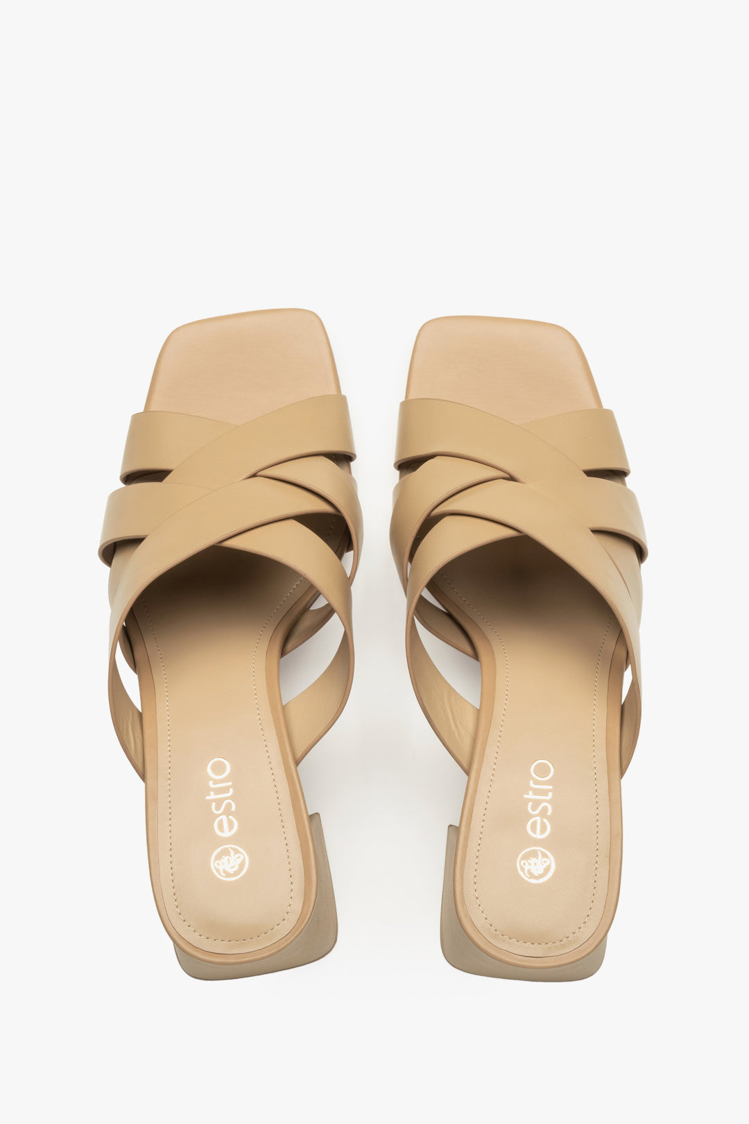 Women's sandals with a block heel made of genuine leather in beige color - top view presentation of the model.