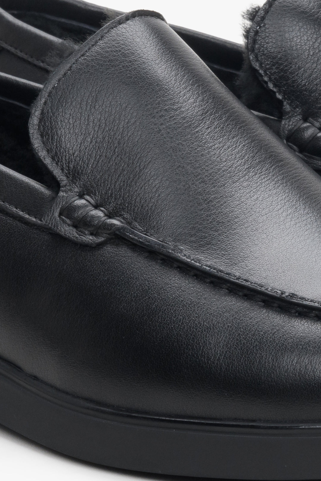 Leather men's black moccasins by Estro - close-up on details.