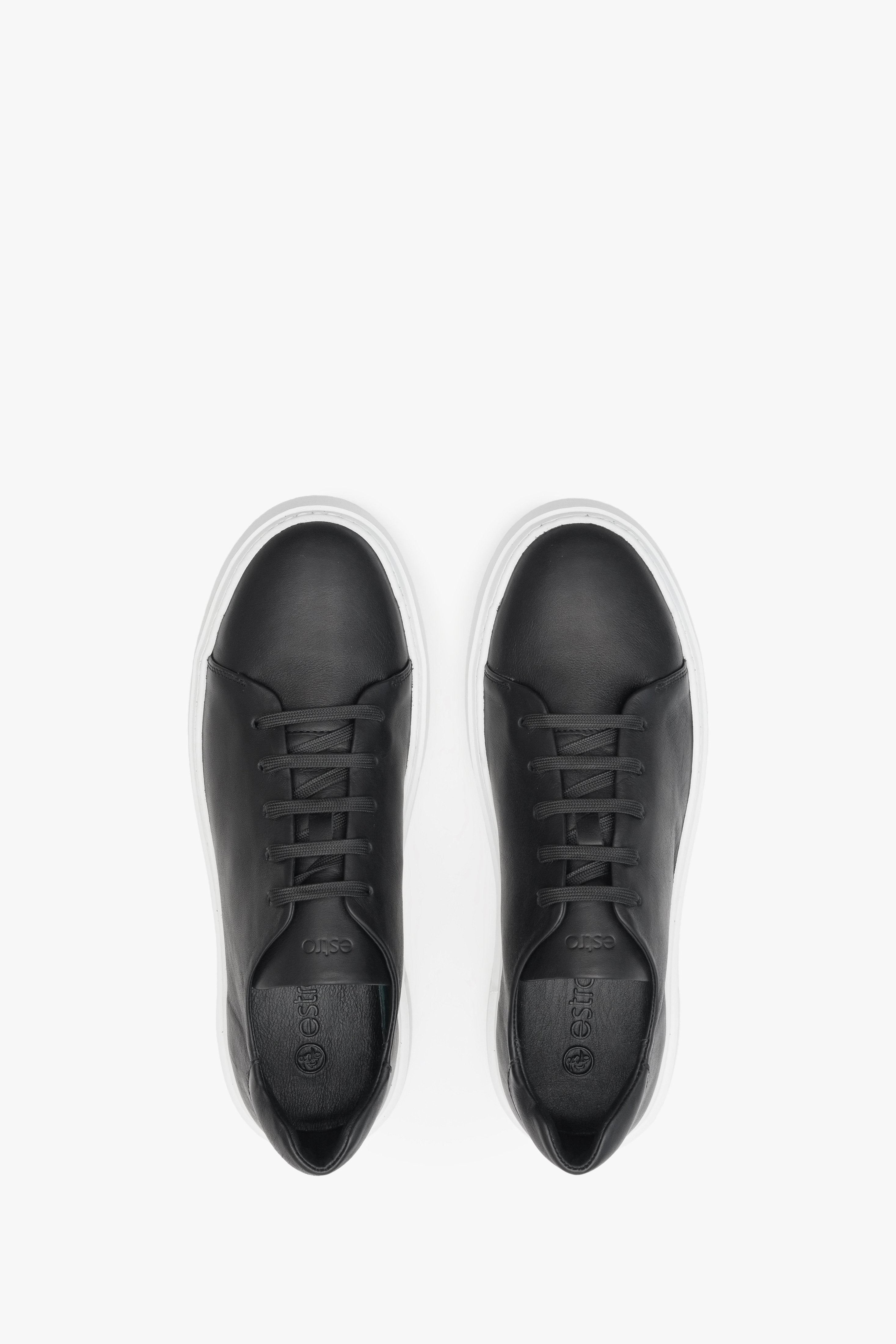 Men's black fall sneakers by Estro made of genuine leather with laces - presentation of the footwear from above.