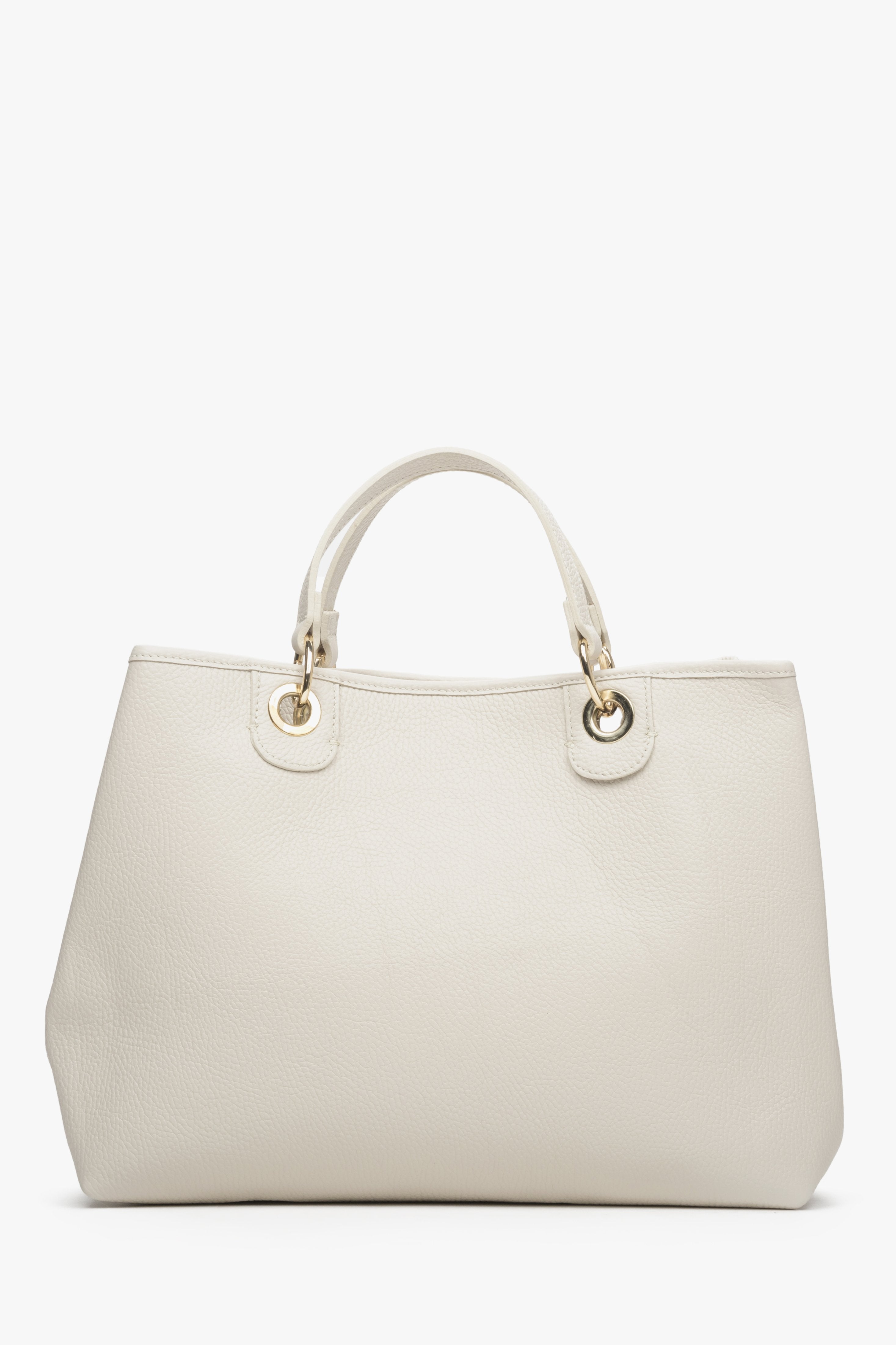 Women's beige leather Estro handbag made from Italian natural leather with gold accents.