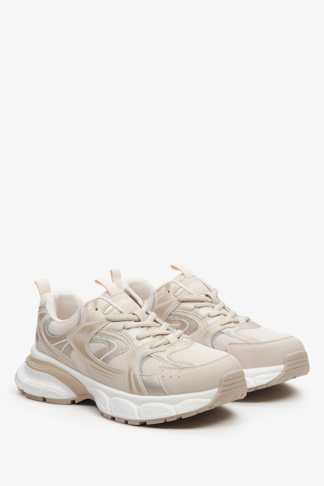 Women's beige and white ES 8 sneakers with golden embellishments.