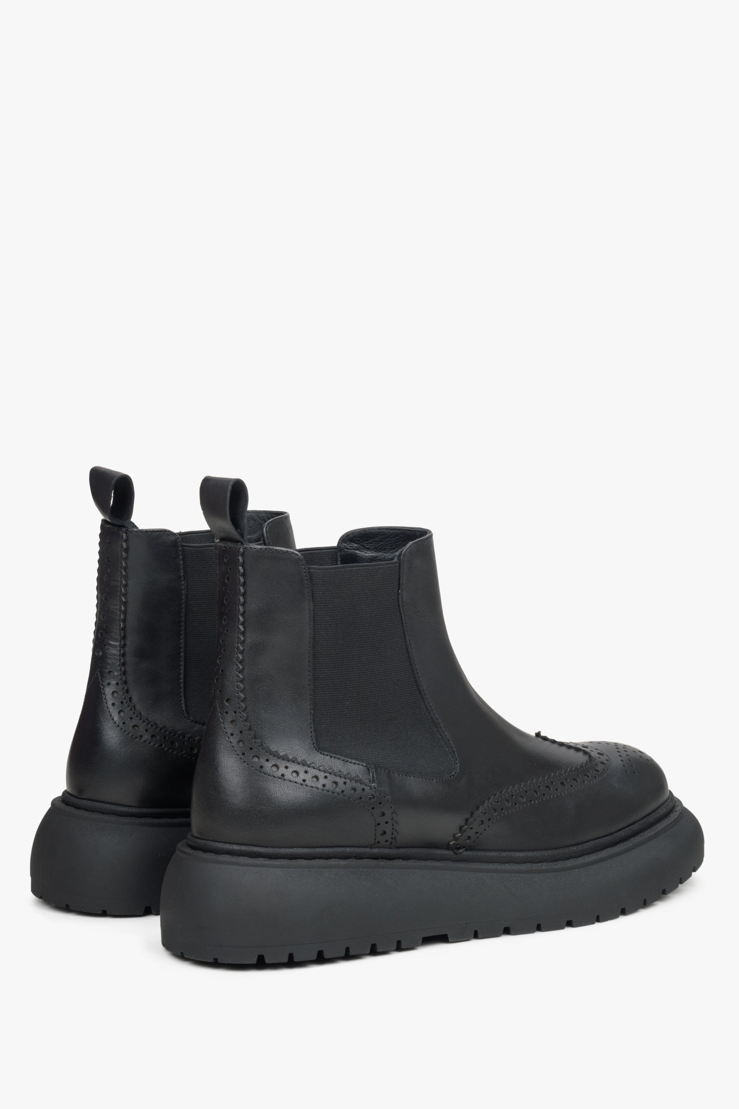 Women's genuine leather chelsea boots in black - a close-up on shoe profile.