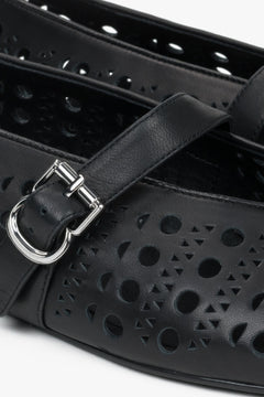 Black perforated women's ballet flats made of genuine leather by Estro - details.