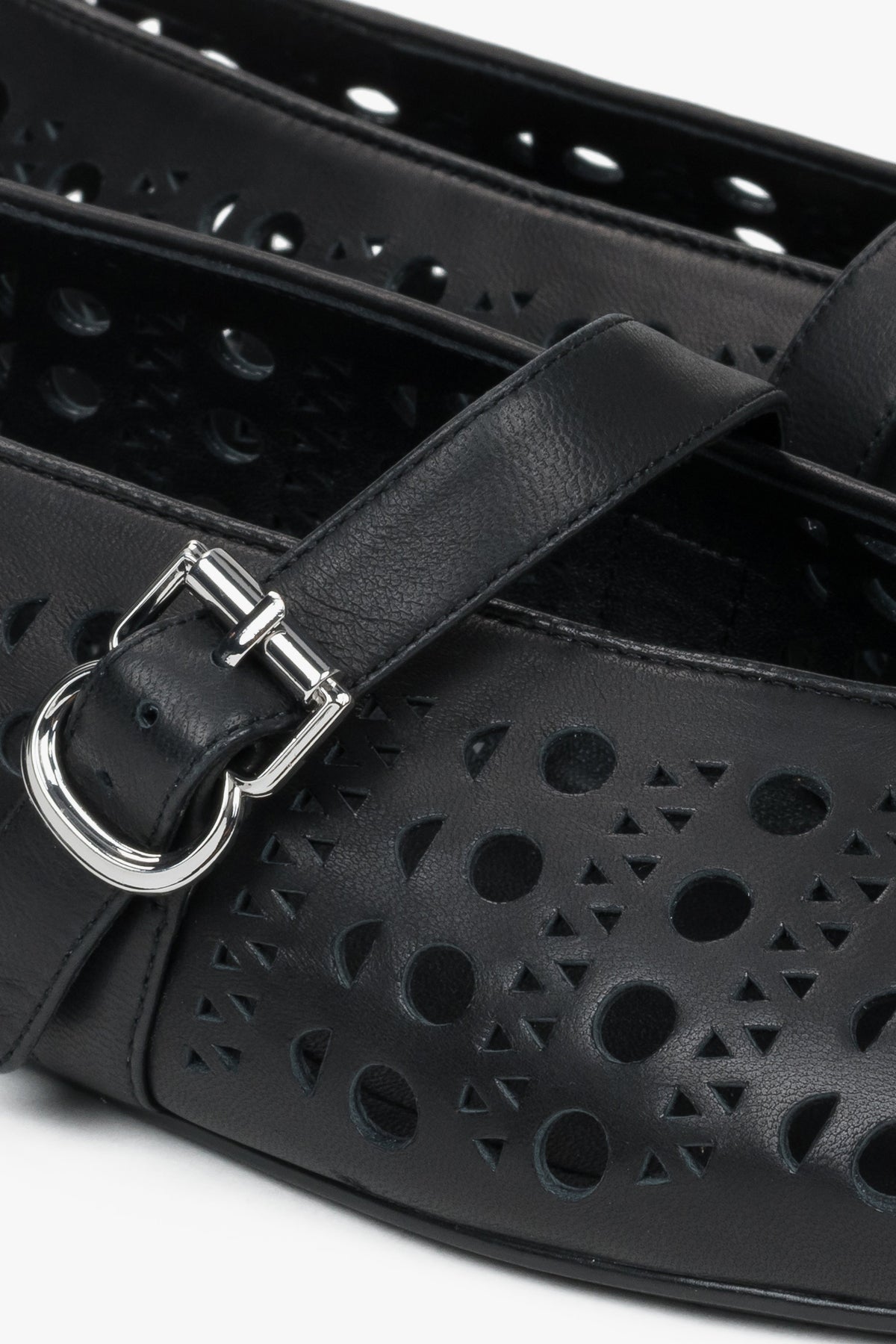 Black perforated women's ballet flats made of genuine leather by Estro - details.