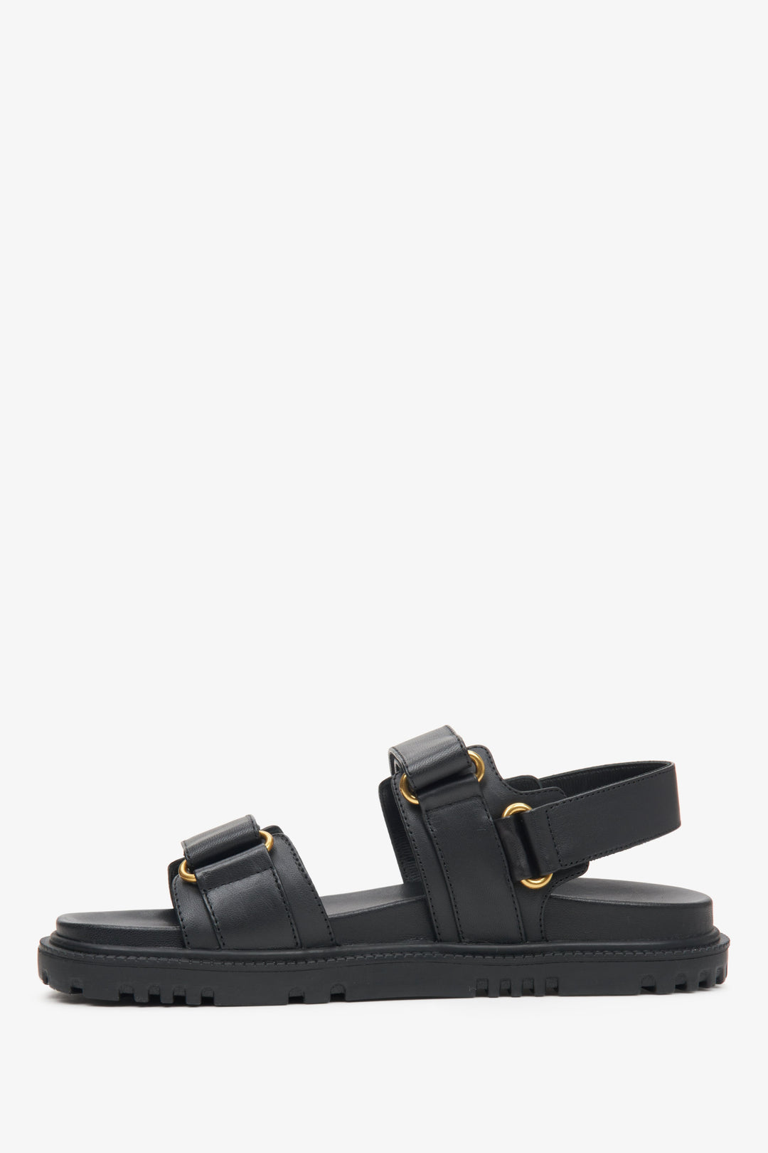 Estro women's black  leather sandals with a flexible sole and golden accents.