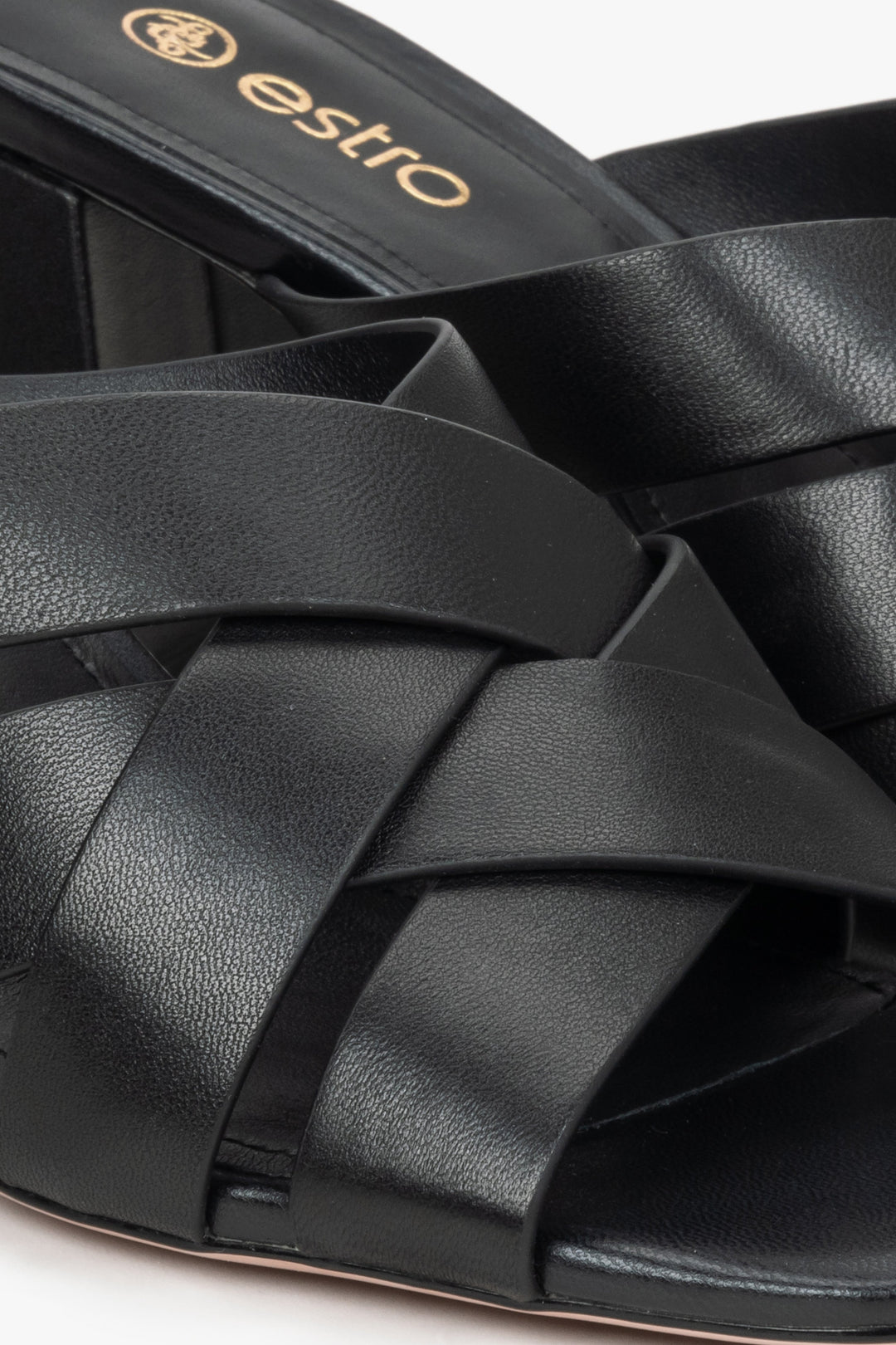 Women's black sandals with Estro heels - close-up on details.