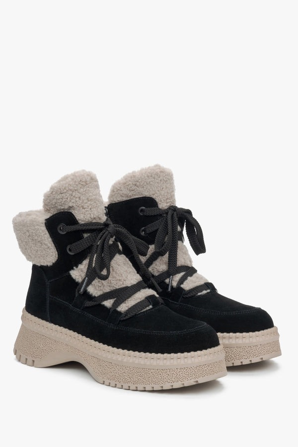 Women's black winter ankle boots with insulation – side profile of the shoes.