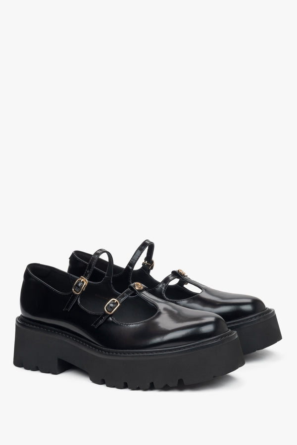 Black leather women's Mary Jane shoes.