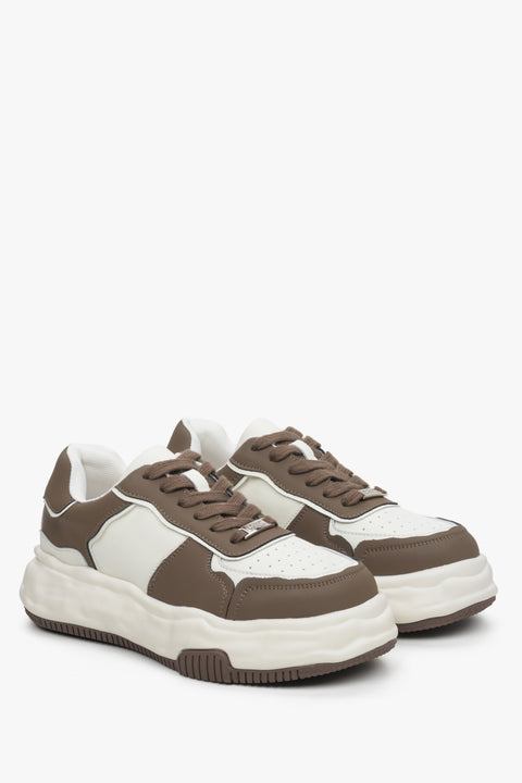 Women's brown and white sneakers by Estro.