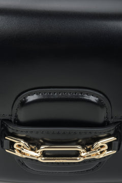 Women's black leather bag - close-up on the detail.
