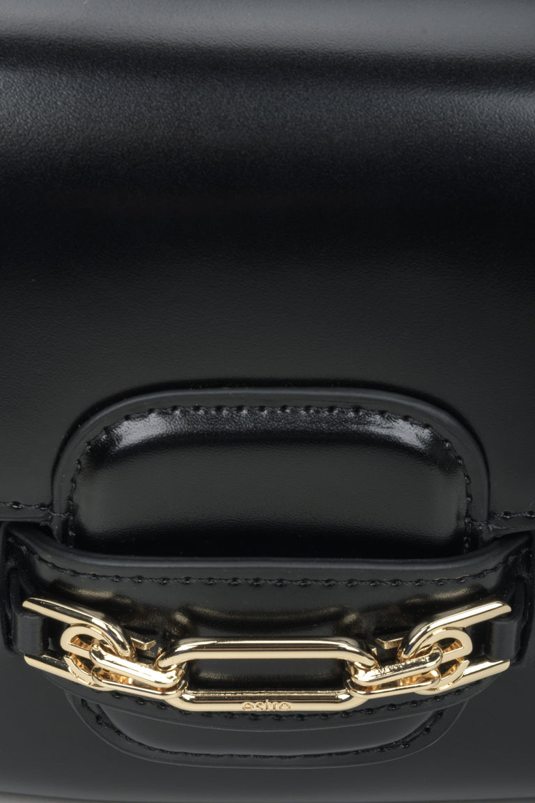 Women's black leather bag - close-up on the detail.