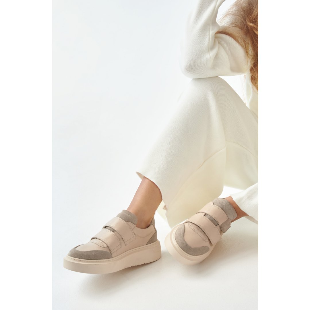 Women's beige velcro sneakers by Estro.