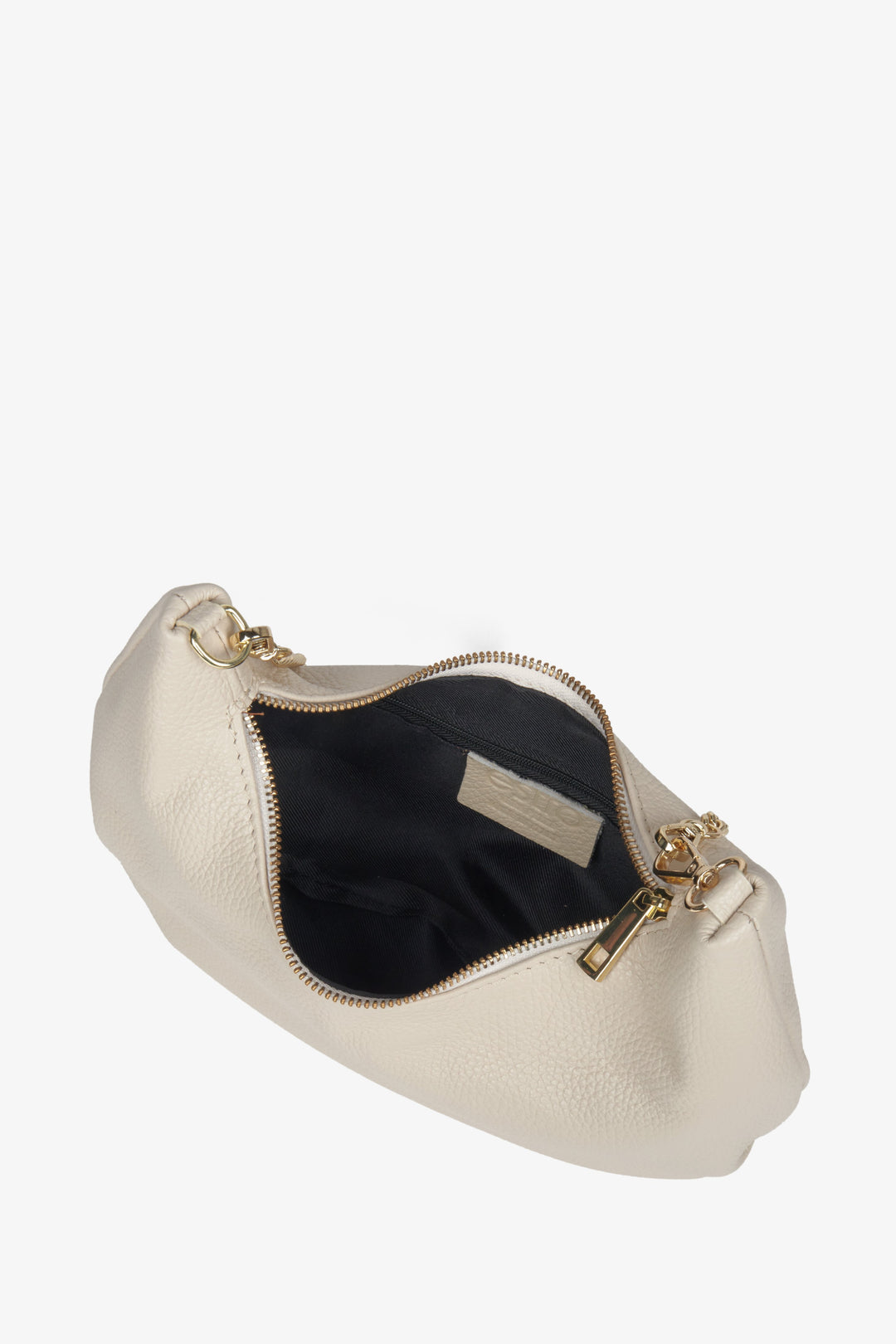 Women's small light beige handbag by Estro with a golden chain.