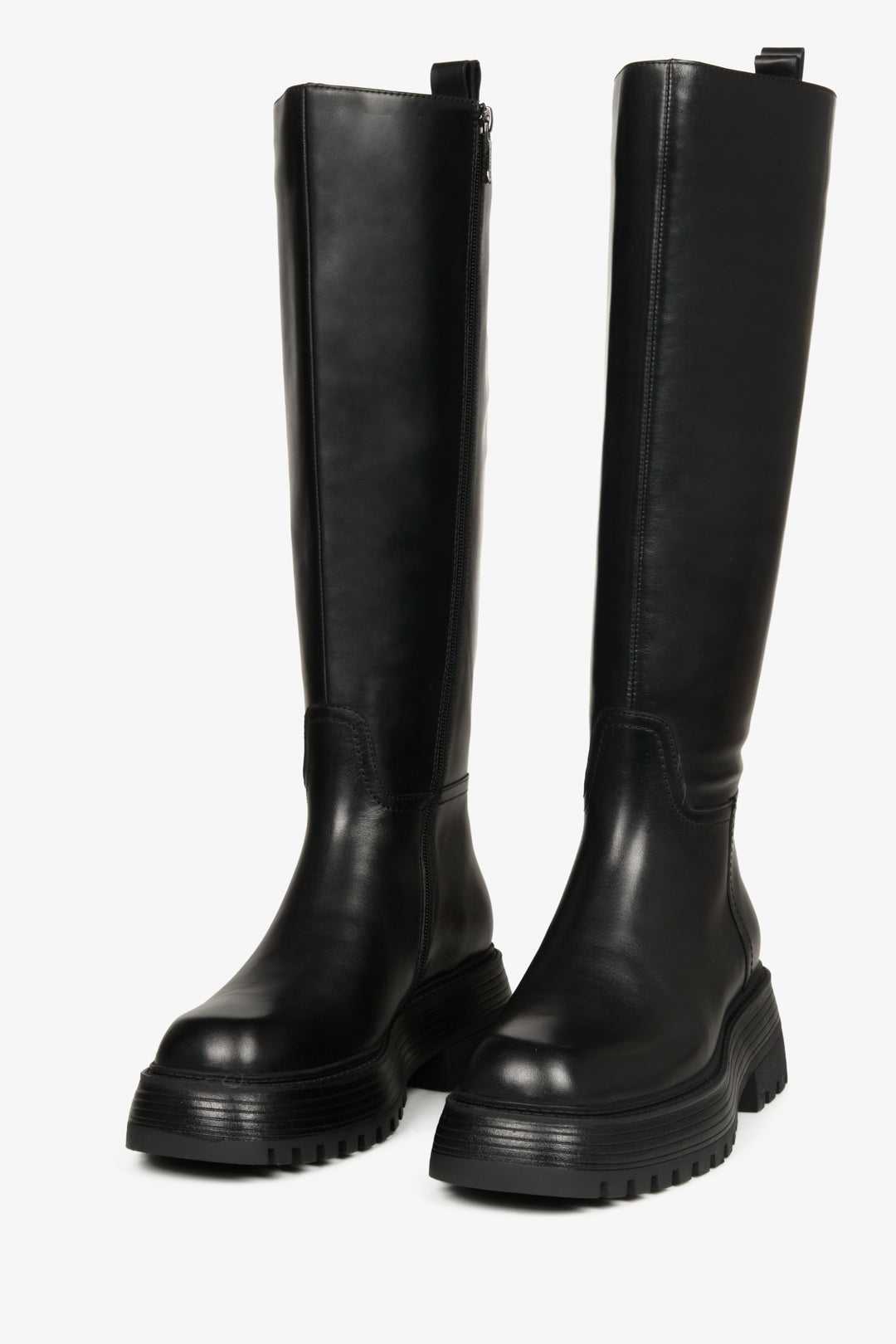 Elevated, fall women's boots made of black genuine leather by Estro - close-up of the front part of the toe line.