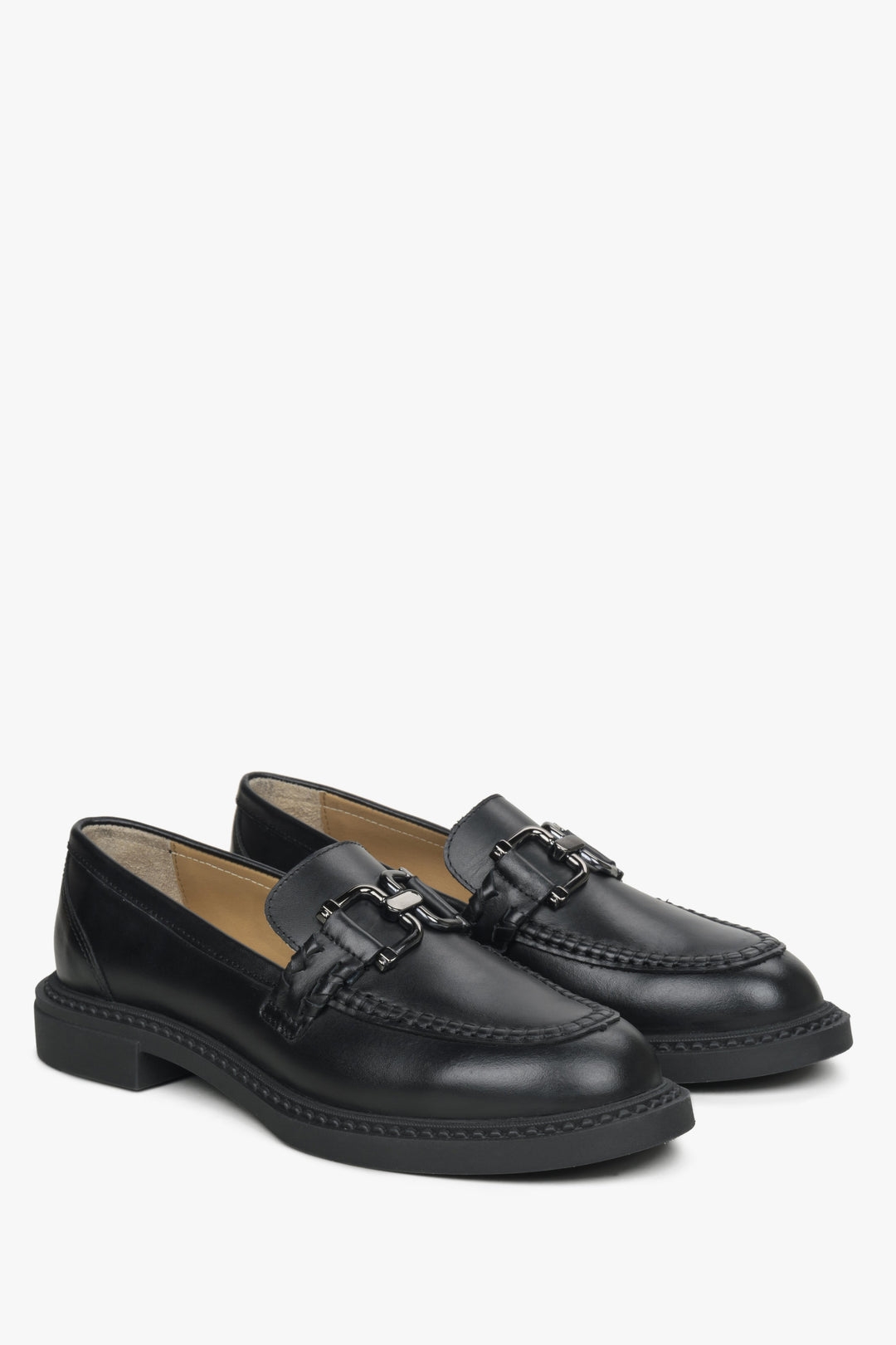 Women's black loafers with a buckle by Estro.