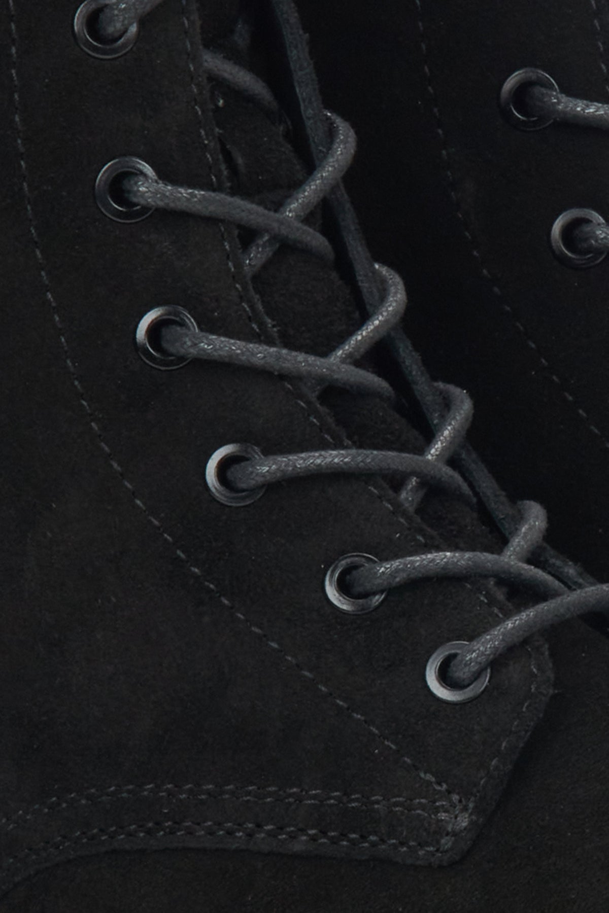 Women's black velour ankle boots by Estro - close-up of the details.