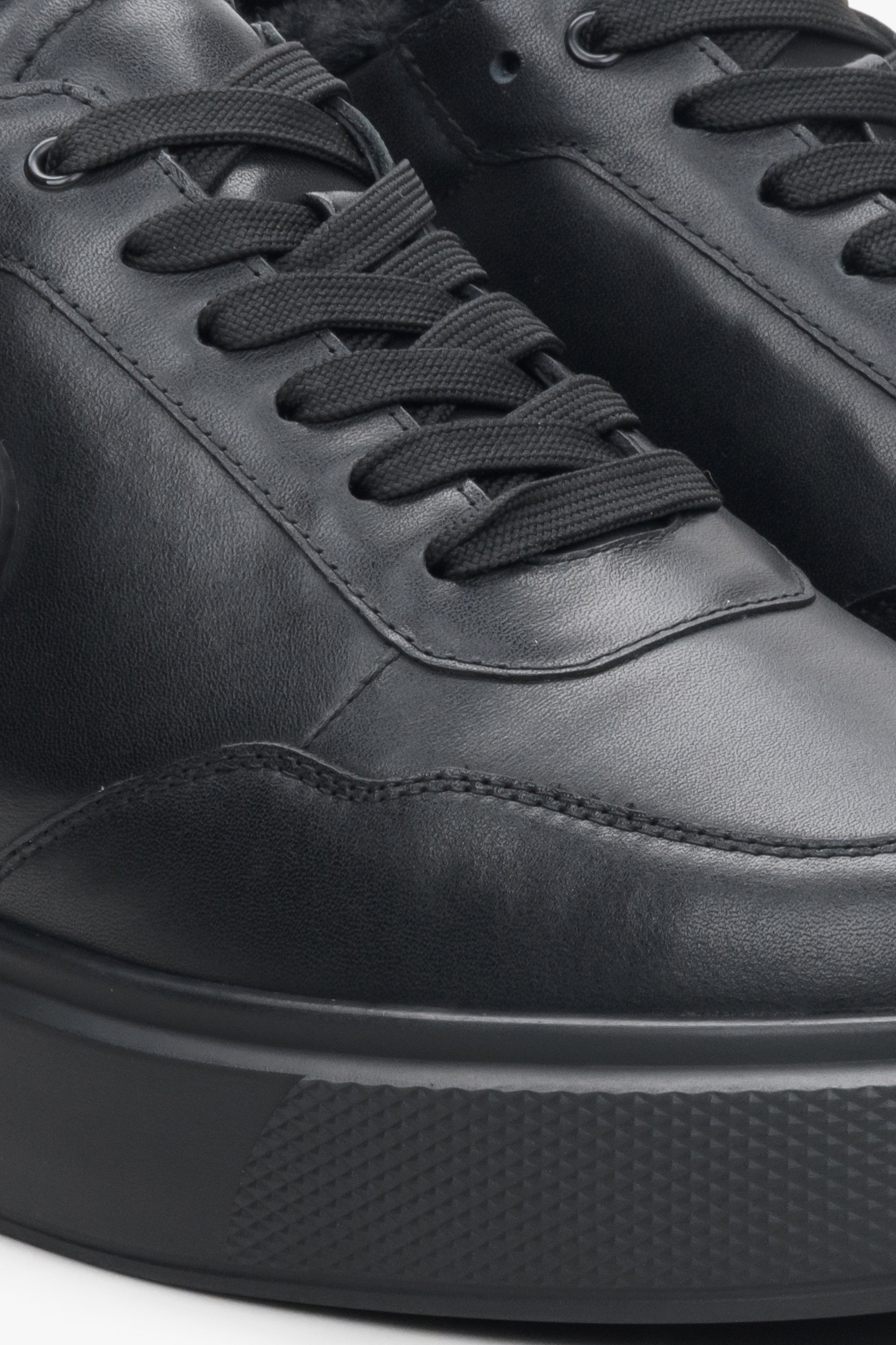 Women's high-top black leather sneakers - details.