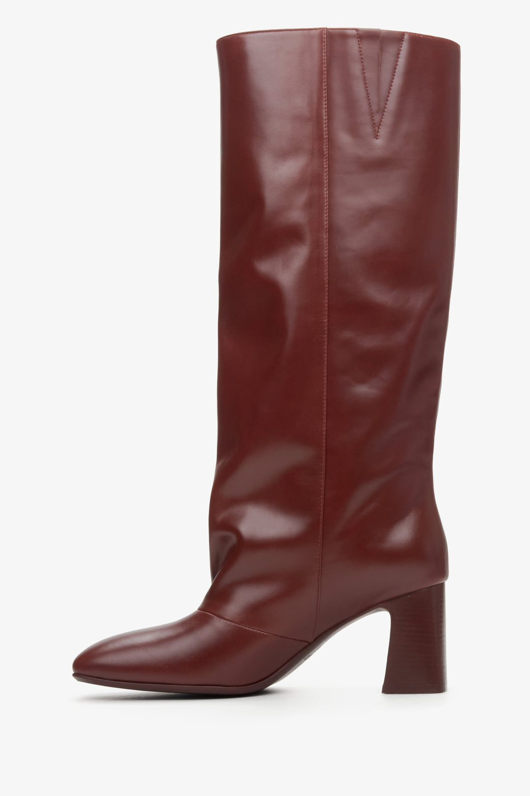 Burgundy leather high boots made of patent leather.