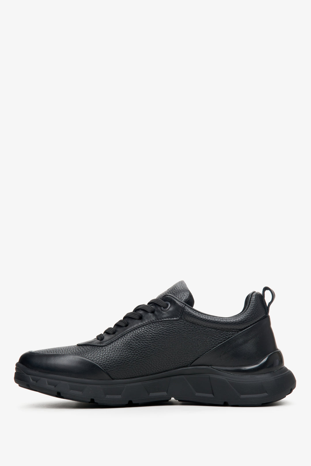 Men's black sneakers made of textured genuine leather by Estro - shoe profile.