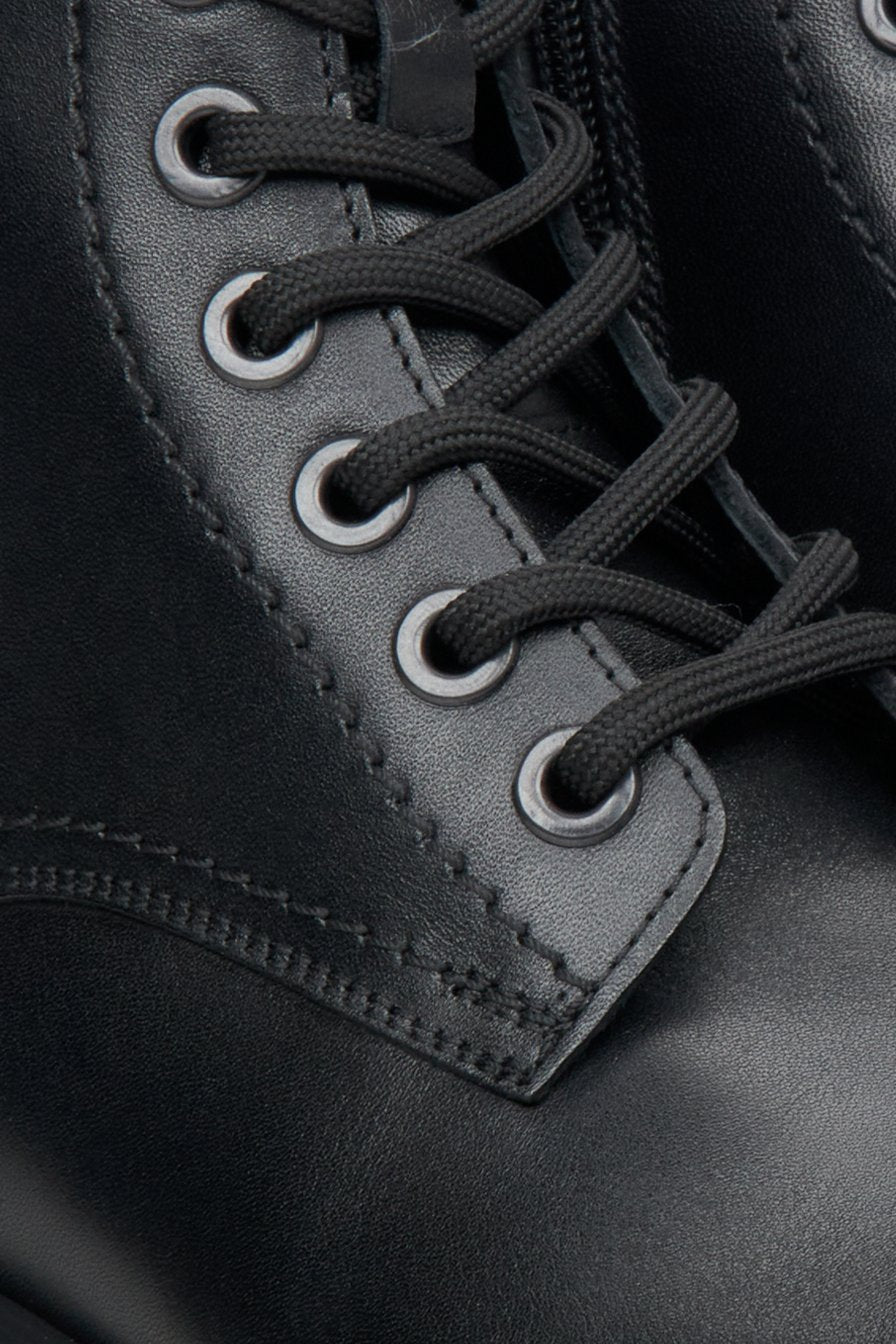 Men's black autumn boots by Estro - close-up on the details.