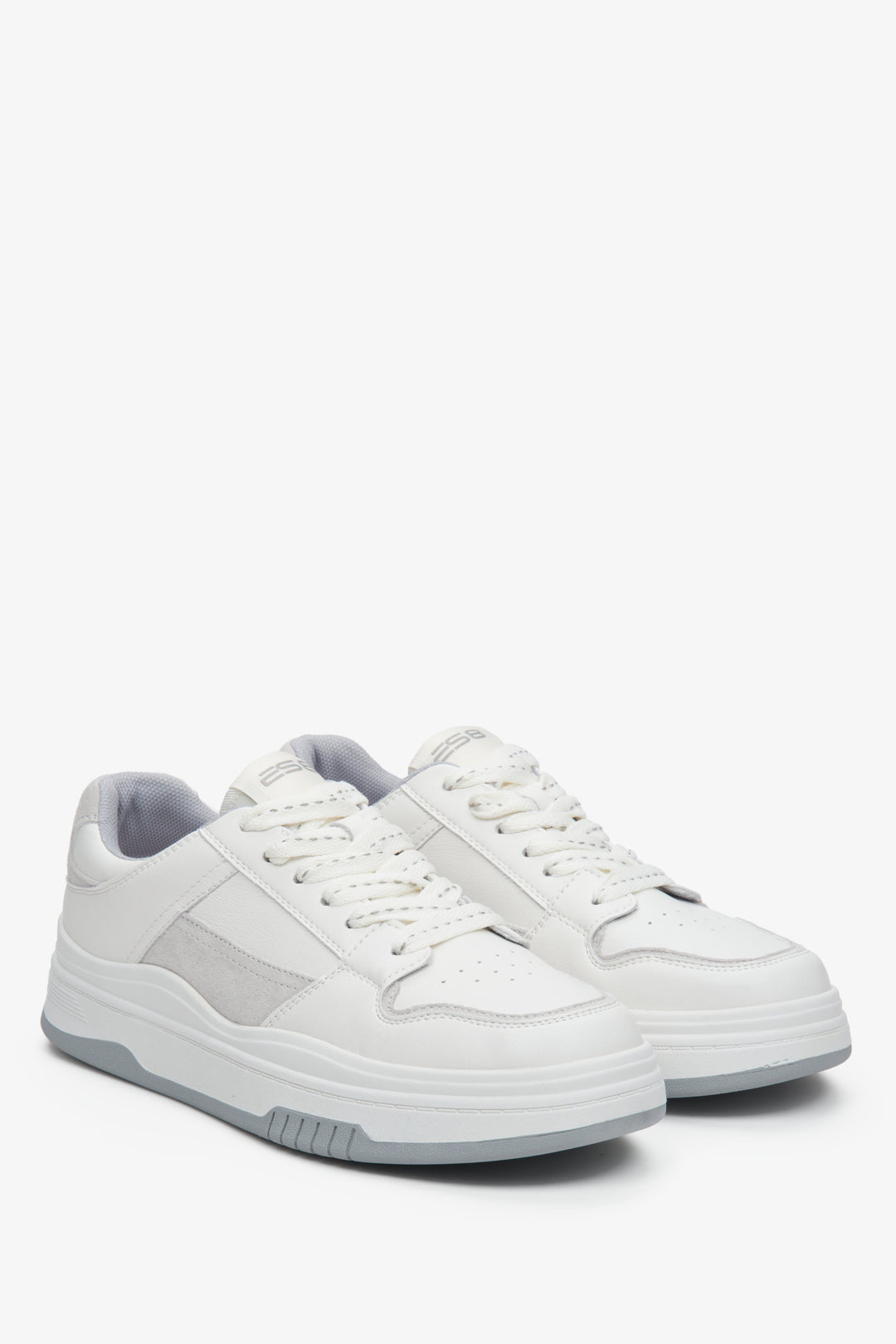 Women's white and grey leather sneakers - presentation of a shoe toe and sideline.